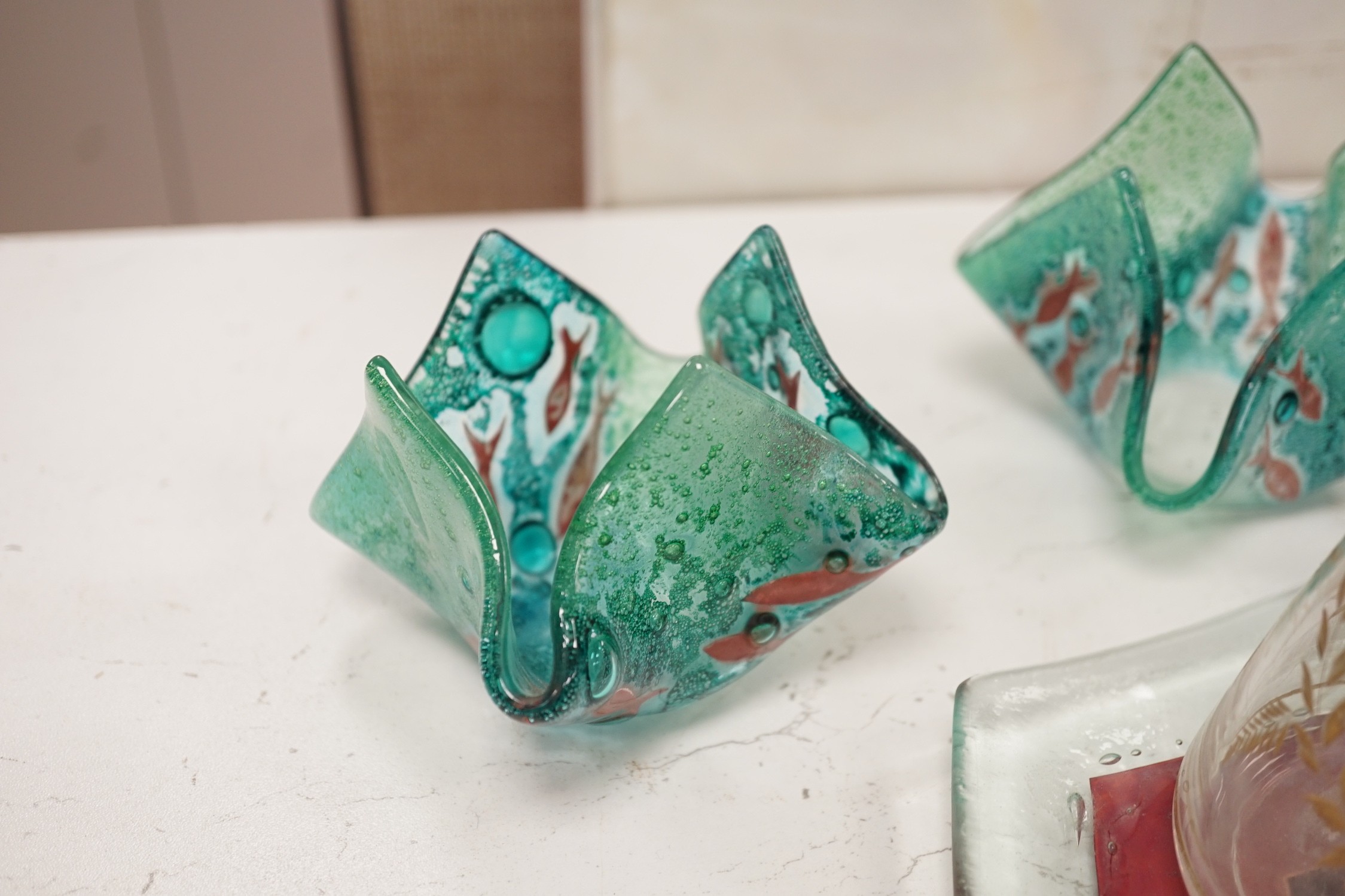 Three glass handkerchief vases and six other glass items